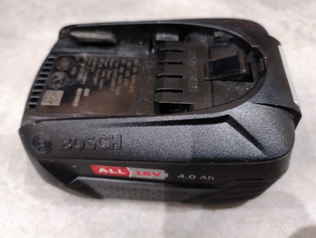 A Bosch Power4All power tool battery.